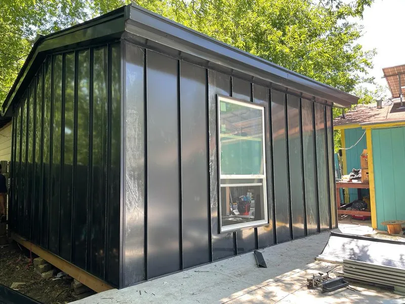 Black standing seam metal wall panels for Metal Roof Installation in Laughlin